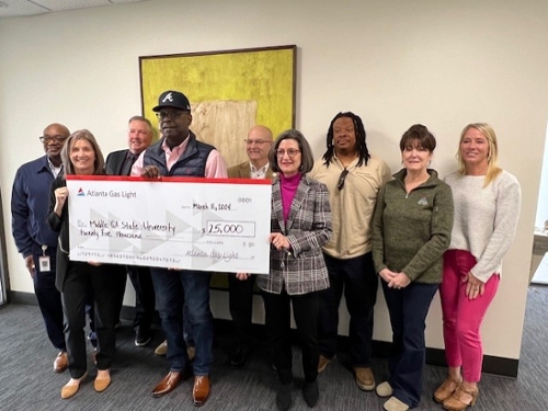 Shown with MGA Foundation representatives Beth Byers, Dr. David Jenks, & Nancy White is the Atlanta Gas Light team. L-R are Ron Hollaway, Harold Pollard, Ron Foster, Robert Spann, Andrea Williams, Jessica Jeffords.